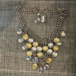 Silver Multi-Tiered Necklace And Matching Earrings